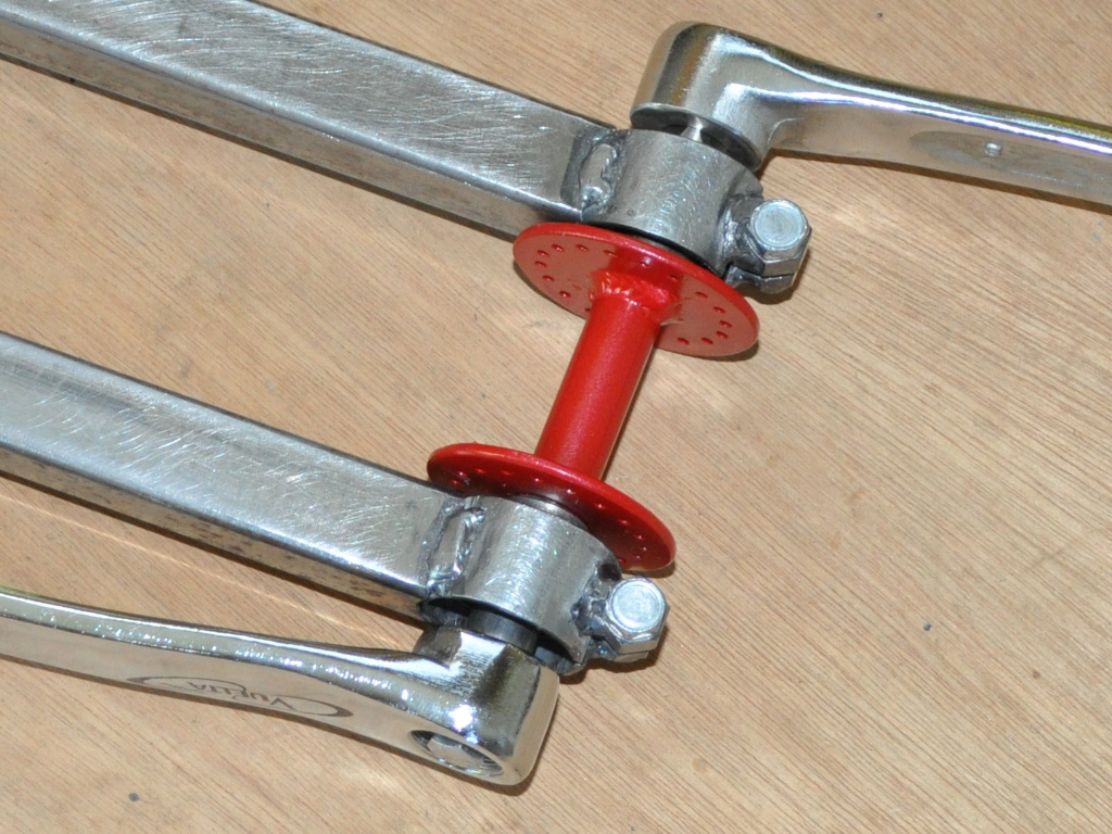 Unicycles Short and Tall - axle cranks